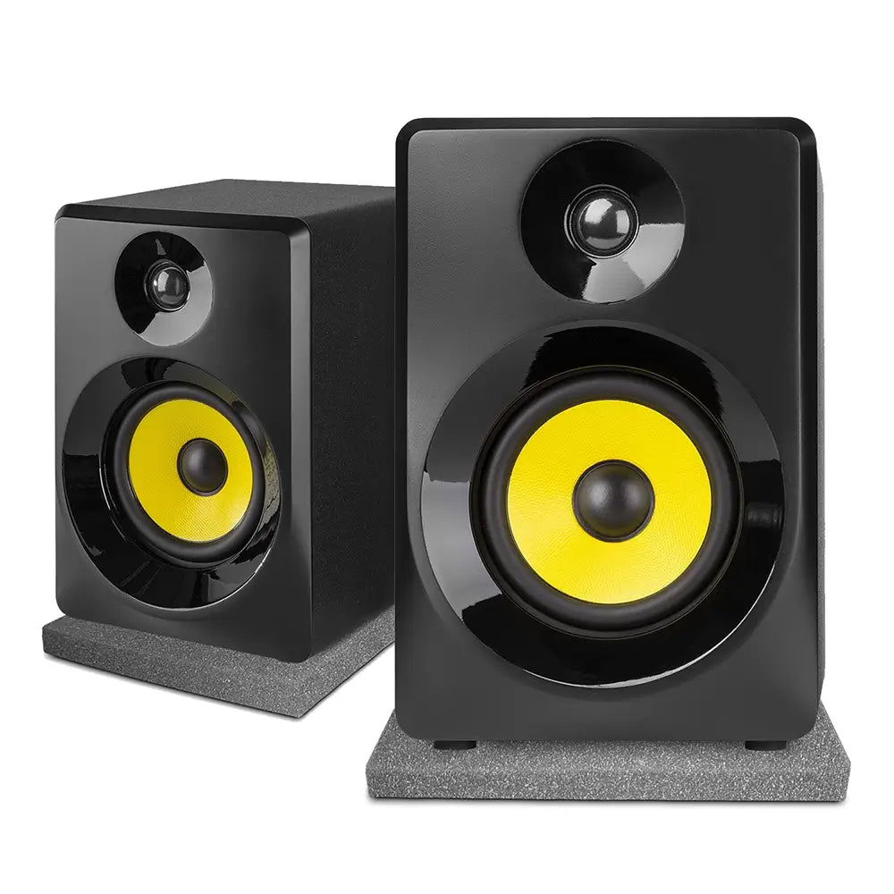 VONYX SMN50B Active Studio Monitor Speakers in black with isolation pads, showcasing a pair of 5-inch speakers designed for studio use.