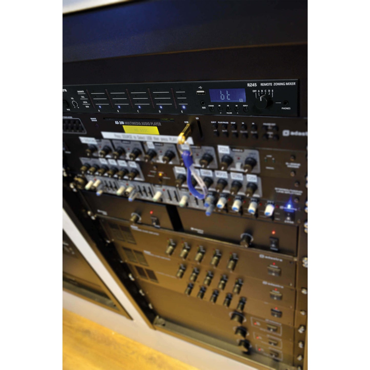 Adastra RZ45 Remote Zone Audio Matrix with Bluetooth, featuring 5-zone control and USB playback capabilities.