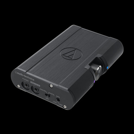 Audio-Technica AT-PHA100 Portable Headphone Amplifier with USB DAC displayed in the image.