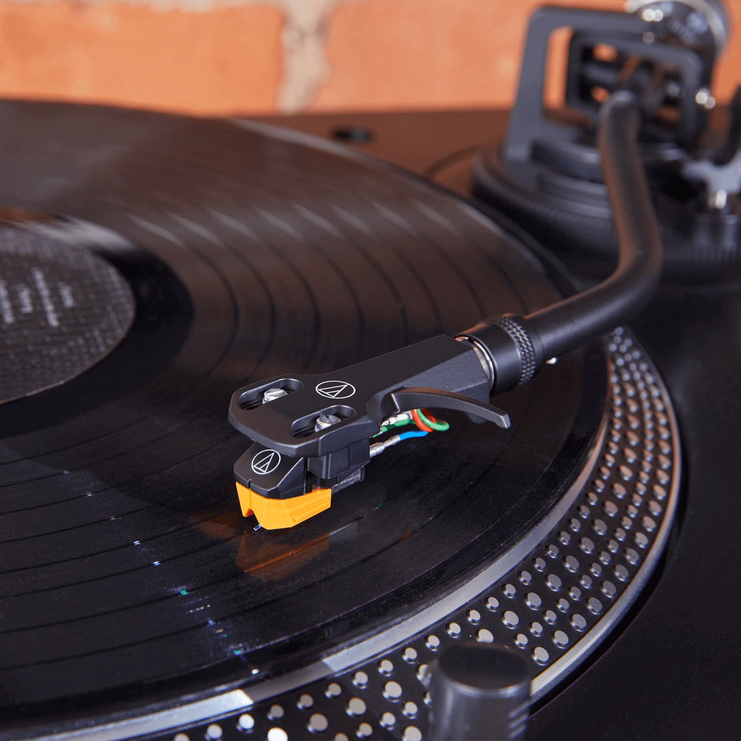 Audio-Technica AT-VM95EN cartridge featuring a nude elliptical stylus, designed for high-fidelity audio playback.