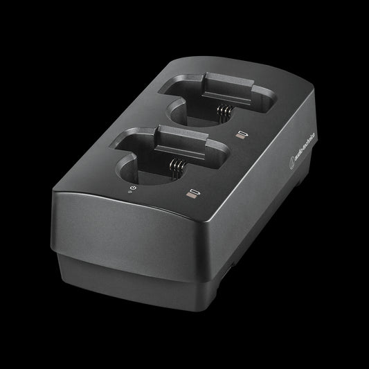 Audio-Technica ATW-CHG3 Two-Bay Charging Station designed for 3000 Series transmitters, featuring a sleek design suitable for microphone and bodypack use.