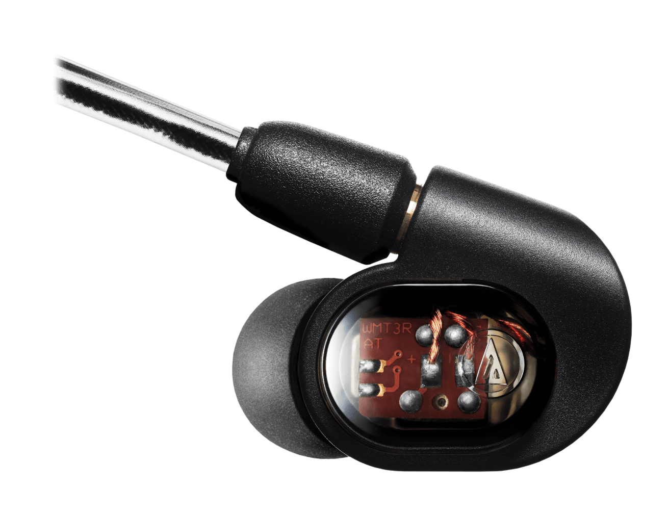 Inside view of the Audio-Technica ATH-E70 professional in-ear monitors with Comply foam eartips and a detachable cable, ideal for precise audio monitoring.