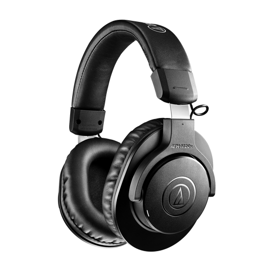 Close-up of Audio-Technica ATH-M20xBT wireless headphones, showcasing their premium design and on-ear controls.