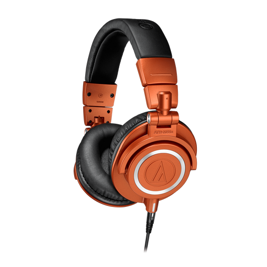 Audio-Technica ATH-M50xMO headphones displayed with swiveling earcups and three detachable cables for versatile studio use.