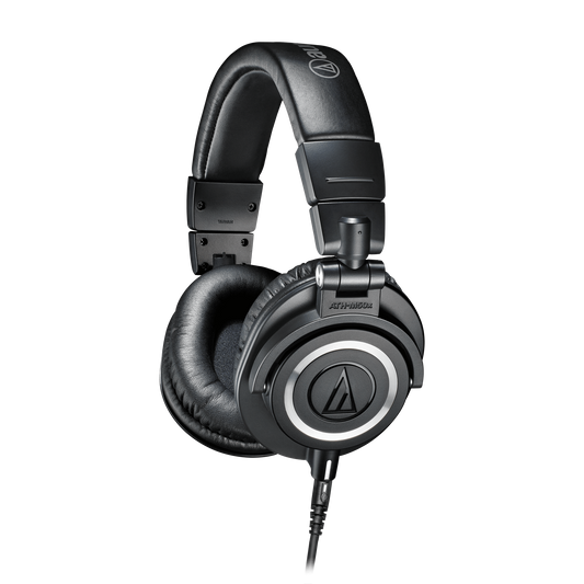 Close view of the Audio-Technica ATH-M50x headphones displayed with swiveling earcups and three detachable cables for versatile studio use.