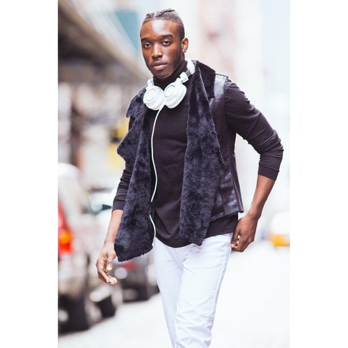 Lifestyle view for the Audio-Technica ATH-M50xWH headphones displayed with swiveling earcups and three detachable cables for versatile studio use.