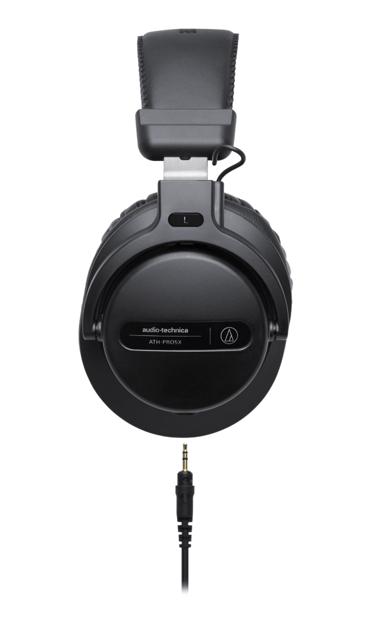 Side view of the Audio-Technica ATH-PRO5X headphones in black, featuring robust construction and versatile, detachable cables for professional DJing.