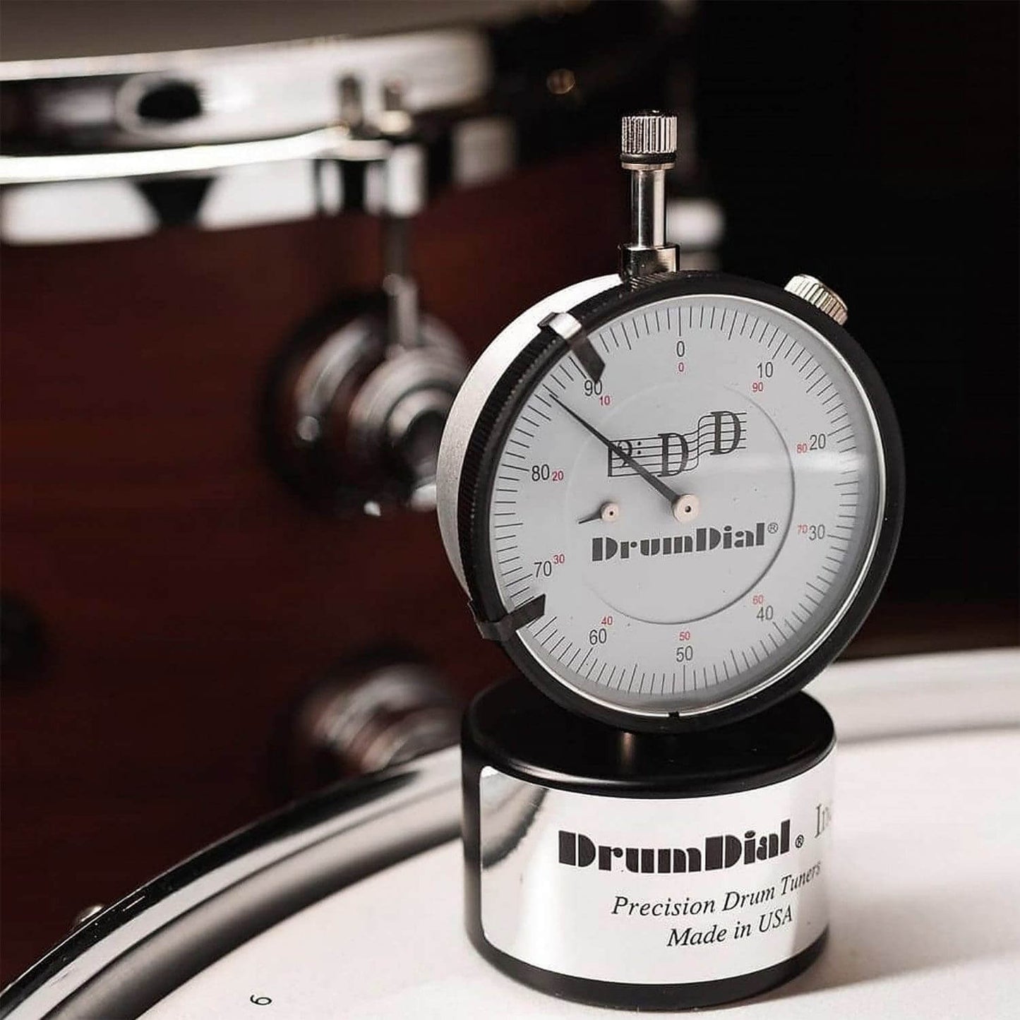 BIG BANG AHEAD DrumDial Digital Drum Tuner, a precision tool for tuning drums, displayed in a clear view.