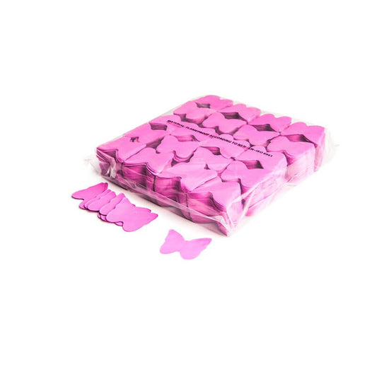 MAGICFX Slowfall confetti butterflies in pink, 55mm size, biodegradable and flameproof, scattered on a surface.