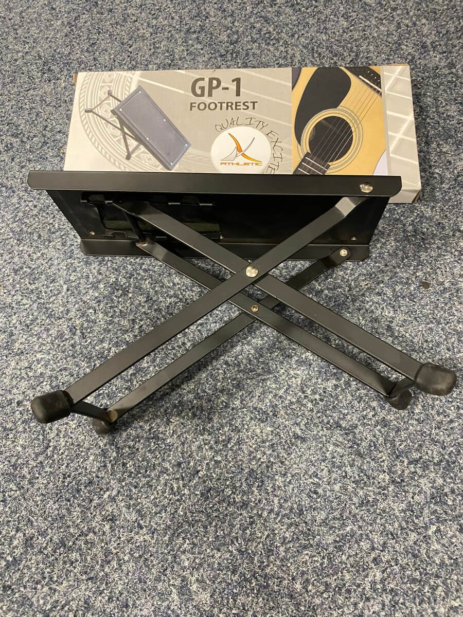 Athletic GP1 Adjustable Guitar Foot Rest designed for enhanced playing comfort, showcasing its ergonomic design.
