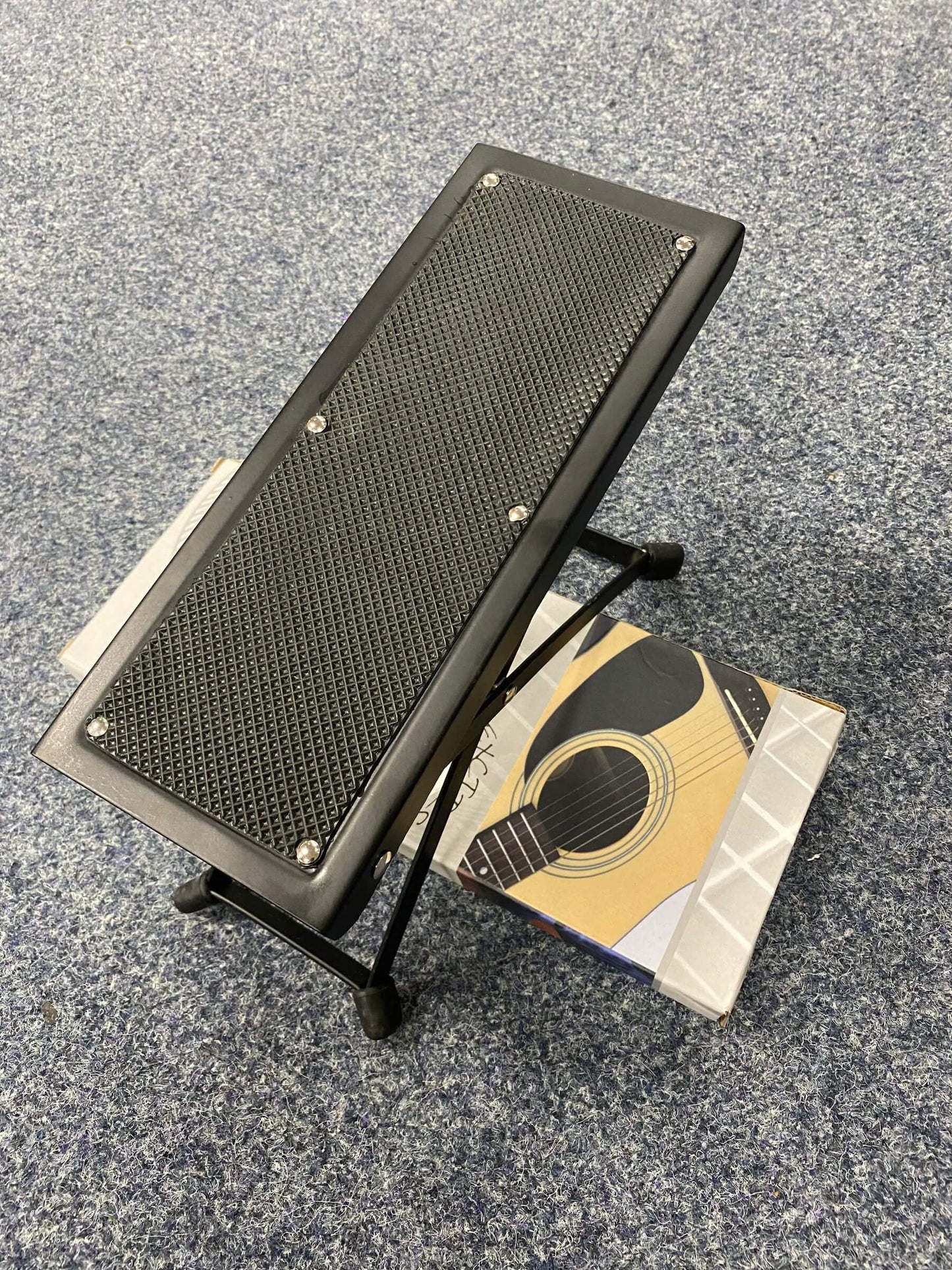 Athletic GP1 Adjustable Guitar Foot Rest designed for enhanced playing comfort, featuring a sturdy and adjustable design.
