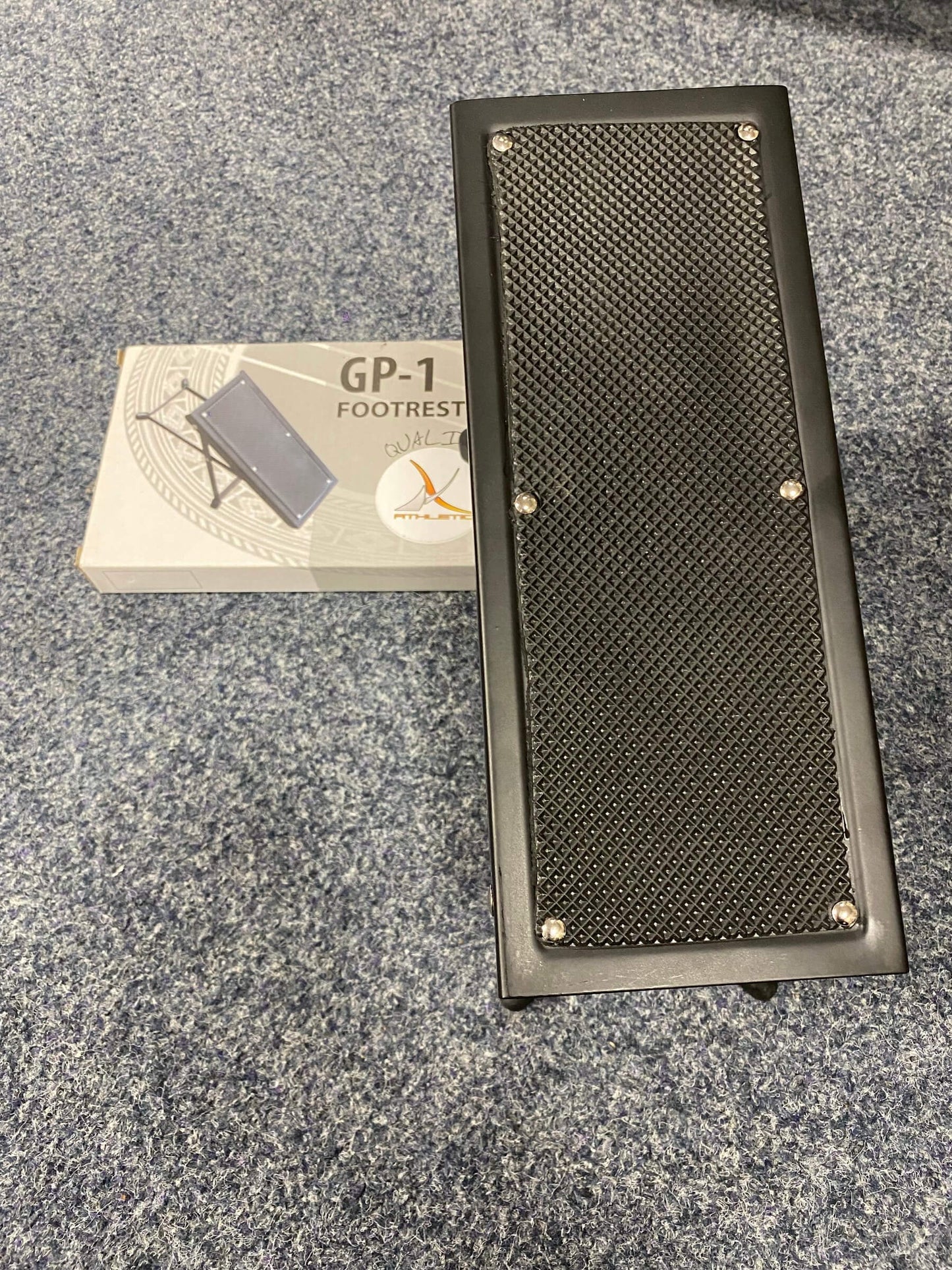 Athletic GP1 Adjustable Guitar Foot Rest designed for enhanced playing comfort, featuring a sturdy and ergonomic design.