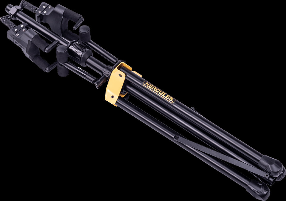 Hercules GS422B Auto Grip Duo Guitar Stand PLUS displayed in a studio setting.