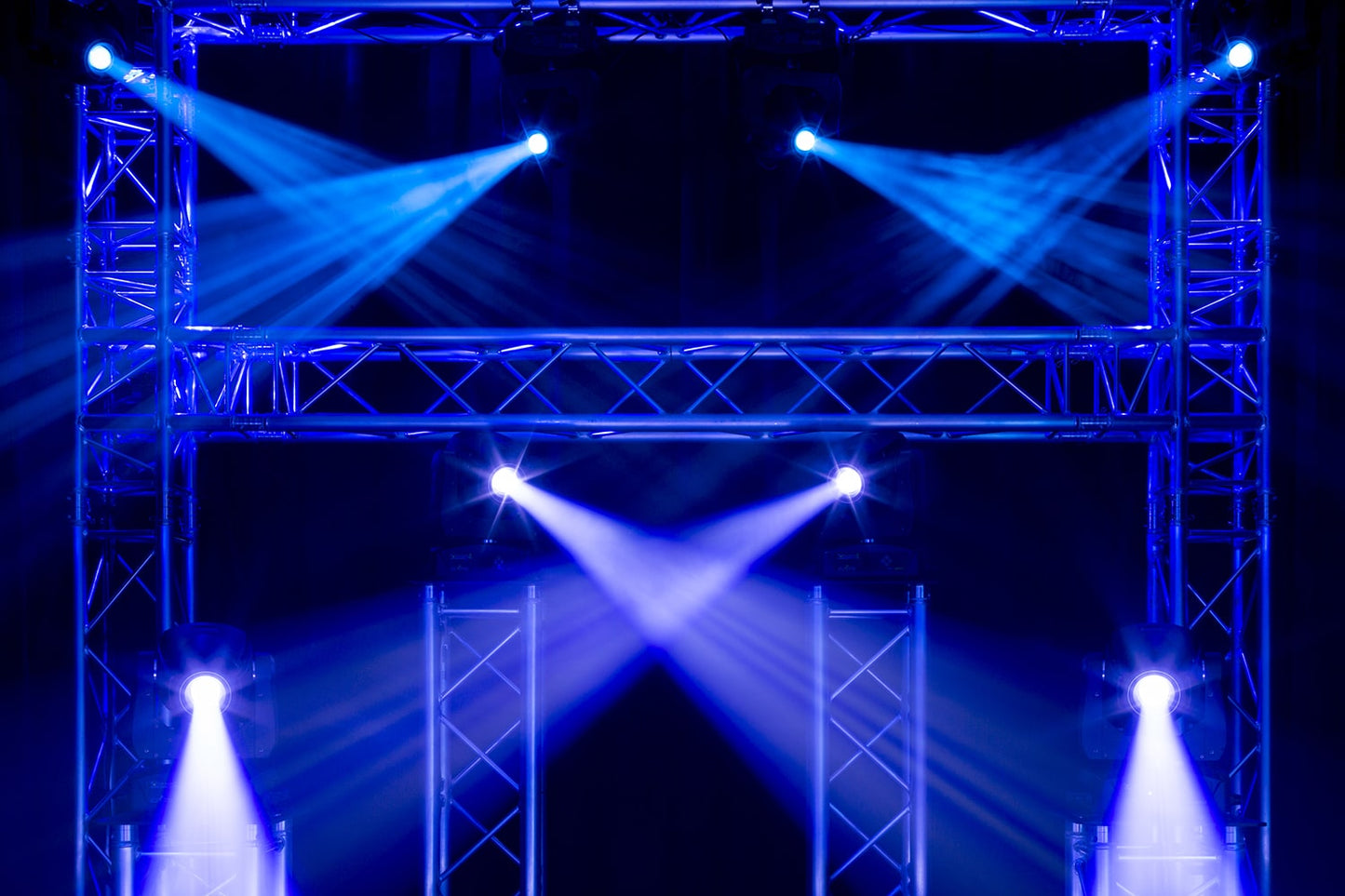 First lifestyle view of the IGNITE180S LED Spot Moving Head set featuring 2x 180W white LEDs, motorized focus, and multiple DMX channels, in a solid flightcase.