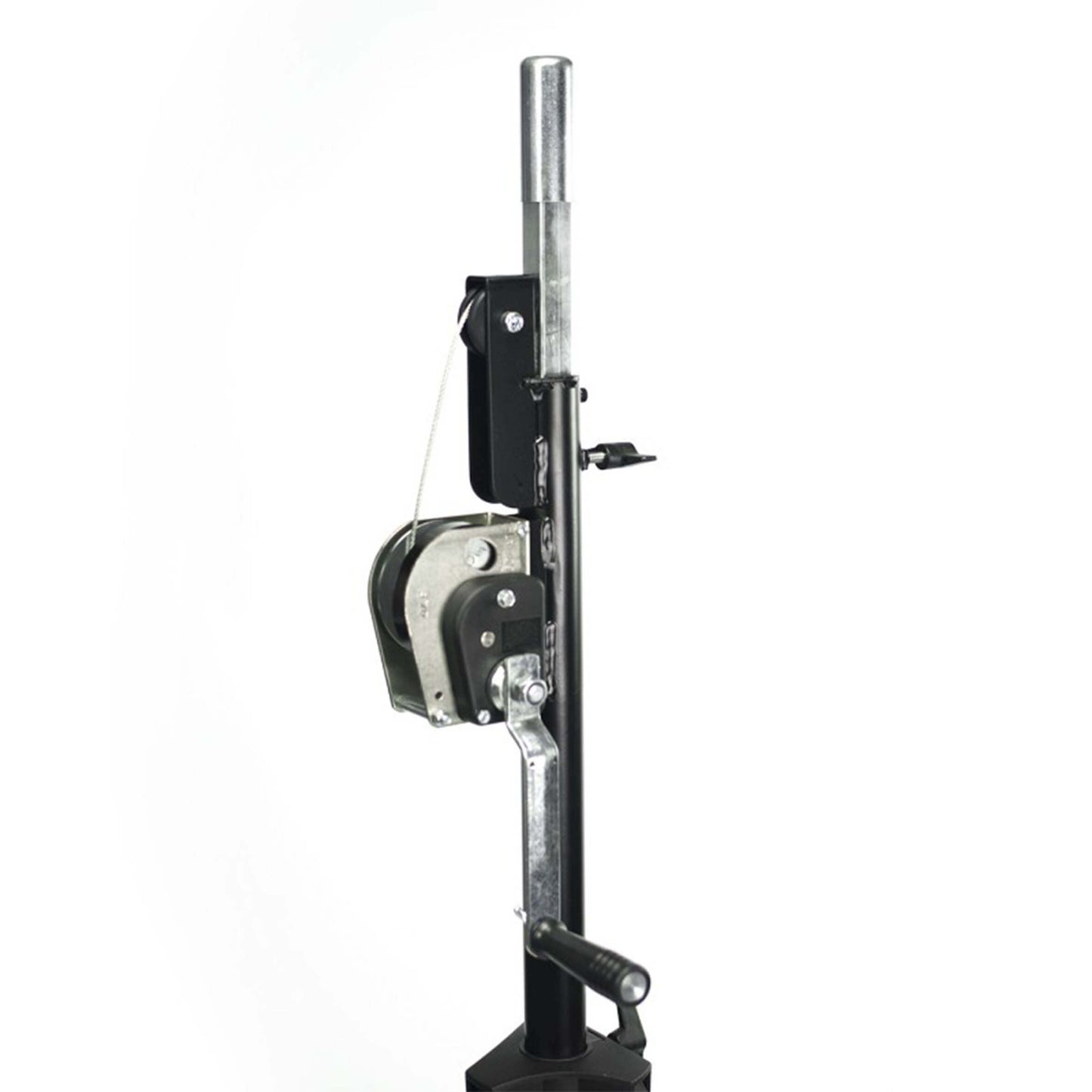 An athletic 80kg heavy-duty winch lighting stand set up for use, showcasing its sturdy design and functionality.