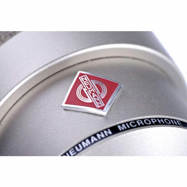 NEUMANN TLM 103 Mono Set, a large diaphragm condenser microphone with a cardioid polar pattern and elastic suspension, displayed against a neutral background.