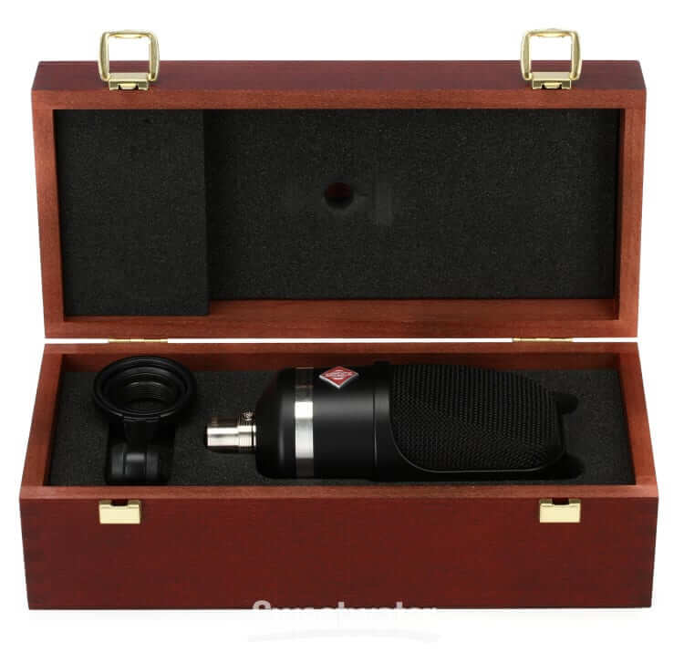 Neumann TLM 107 large diaphragm microphone with multipattern capabilities, accompanied by SG 2 swivel mount and presented in a wooden box.