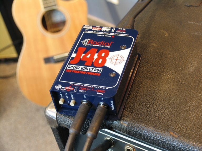 Lifestyle image view of the Radial J48 Active Direct Box for professional audio applications.