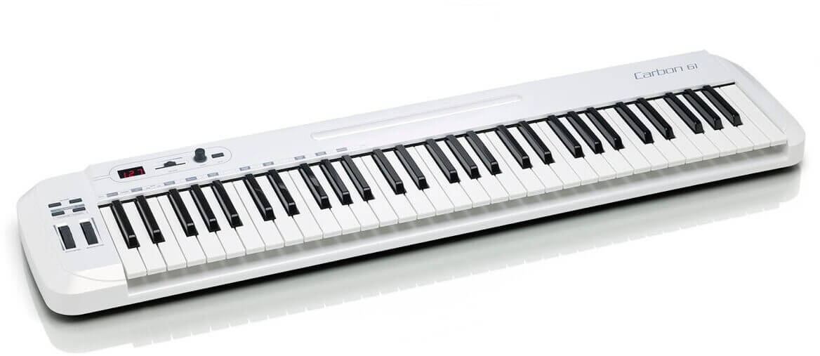 Samson Carbon 61 - 61-Key USB MIDI Keyboard Controller with assignable controls and iPad slot, shown at an angle.