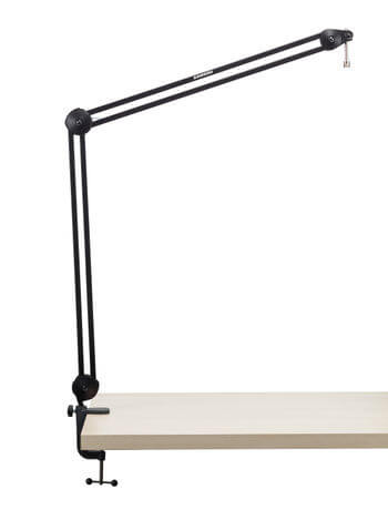 Samson MBA48 microphone boom arm clamped to a table, showcasing its sturdy design and functionality.