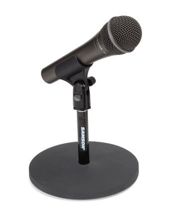 Samson MD5 desktop microphone stand positioned with a microphone, showcasing its sturdy design.