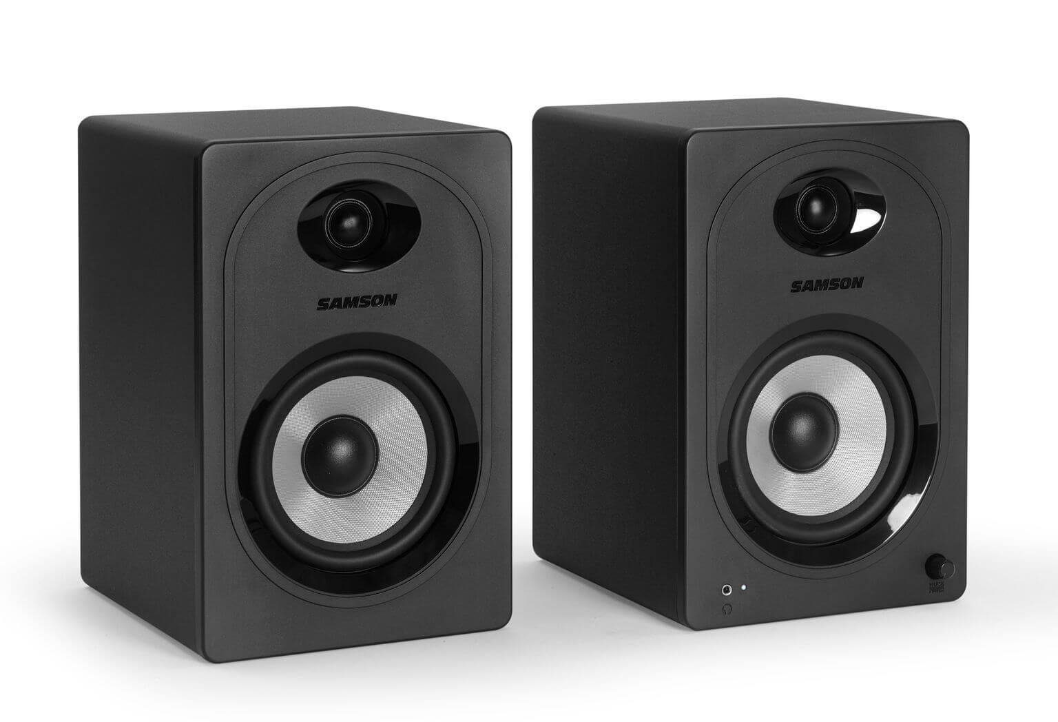 Samson MediaOne M50BT compact stereo multimedia speakers featuring 5.25 inch woofers, 3/4 inch tweeters, Bluetooth capability, and bass boost, displayed at an angle.