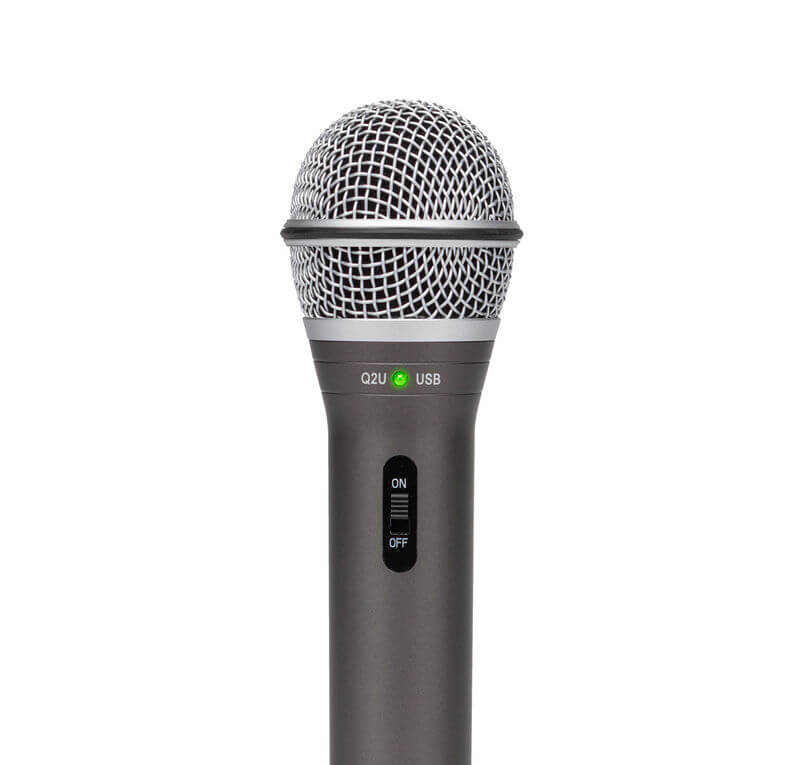 Samson Q2U handheld dynamic USB/XLR microphone with cardioid pattern, featuring a headphone output and included accessories.