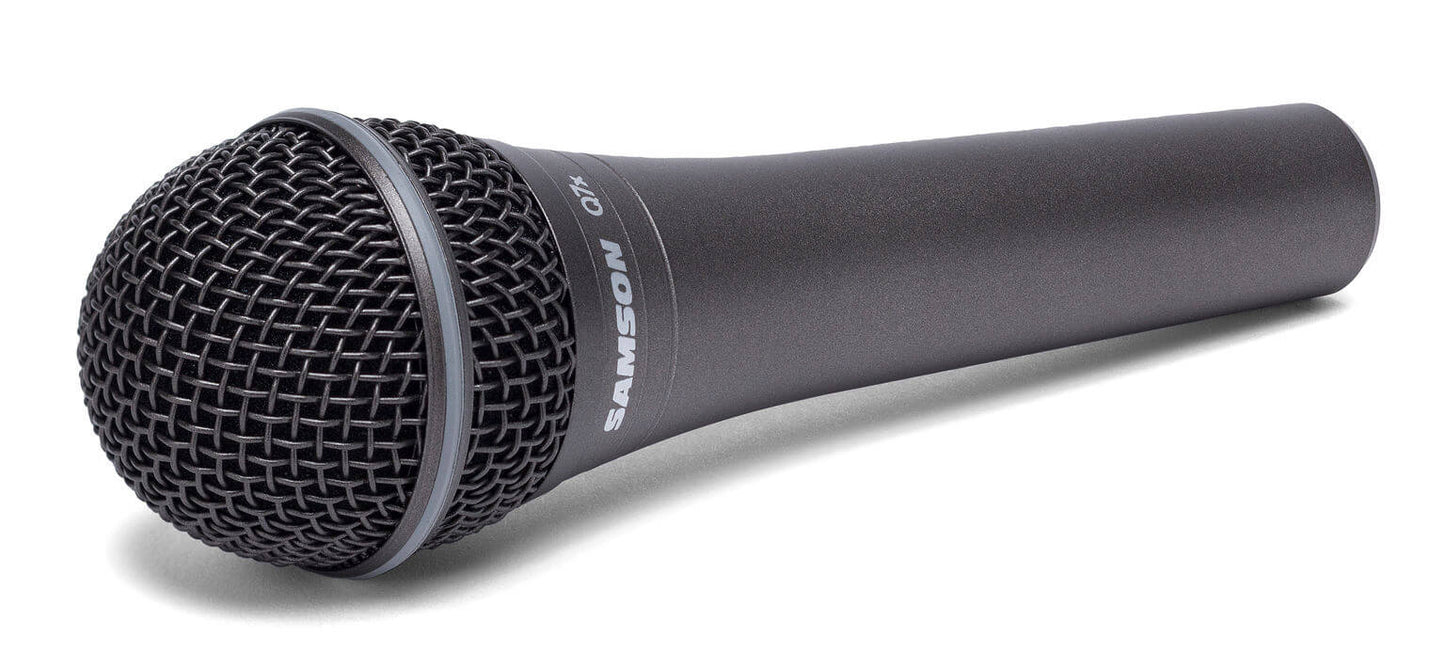 Samson Q7x neodymium dynamic vocal microphone laying on a surface, showcasing its supercardioid pattern and improved shockmount design.