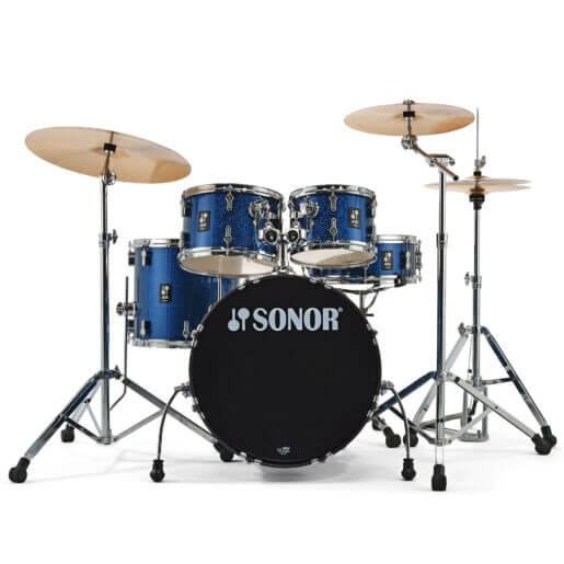 Sonor AQX Studio Drum Set in Blue Ocean Sparkle finish, complete with cymbals, displayed in a studio setting.