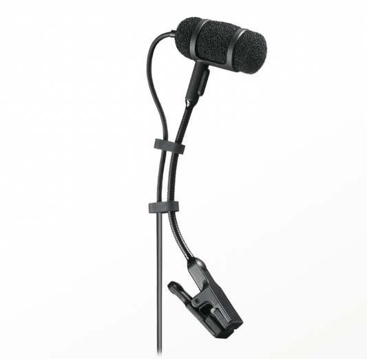 An Audio-Technica PRO35 clip-on microphone attached to a saxophone, capturing vibrant sounds during a live performance.