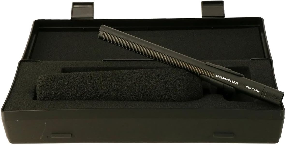 Top view of the Top image of the Sennheiser MKH 416-P48 Shotgun Microphone for precise audio capture with microphone clamp and windshield in it's box.