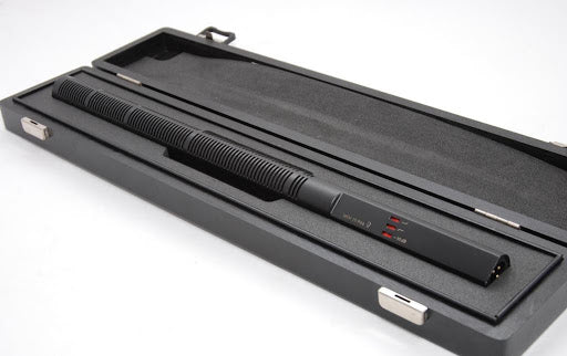Top view of the Sennheiser MKH 70-1 Long Gun Microphone for professional audio capture in box.