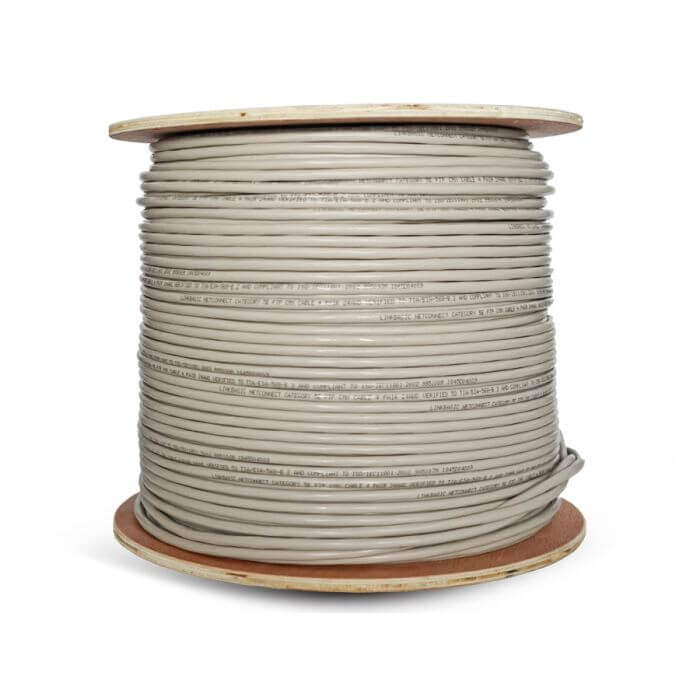 Linkbasic 305m Cat5e Solid Shielded Grey FTP Cable displayed in a professional setting.
