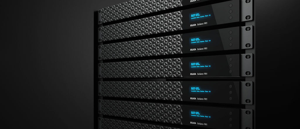 Xilica Solaro FR1 64x64 Dante DSP with Dual NIC, showcasing its modular I/O and HearClear AEC features.