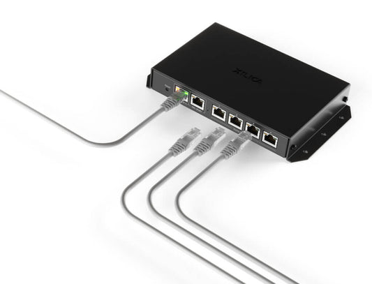 Xilica Four Channel PoE Amplifier with integrated Dante networking, designed for use with Sonia C5 in-ceiling loudspeakers, showcasing RJ45 connections.