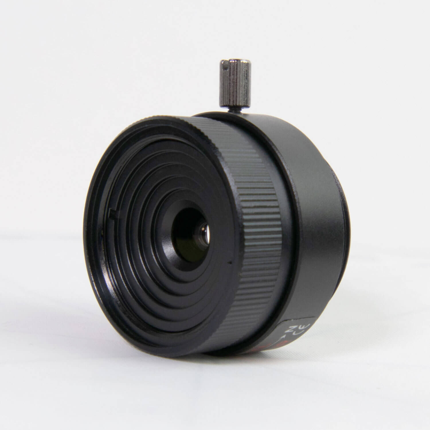 AIDA Imaging 12mm HD CS Mount Lens designed for 1.3 to 5MP cameras, showcasing its fixed focal design.