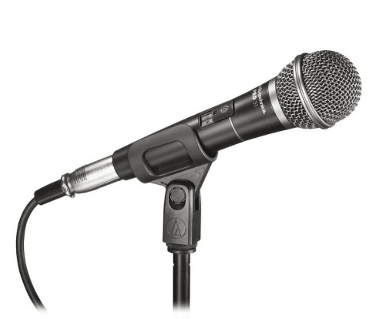 Audio-Technica PRO31QTR dynamic microphone from the side on a stand connected with XLRF-Jack cable.