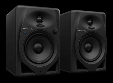 Pioneer DM-50D-BT 5-inch bi-amped Bluetooth desktop monitor speakers in black, showcasing their design and features.