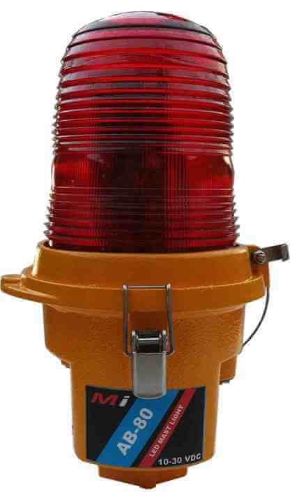 Micro Instruments LED Aircraft Beacon in red color, designed for 10-30V power supply, showcasing its compact and bright design.