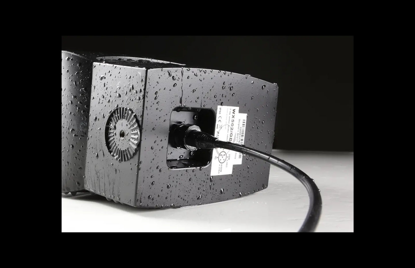 Backside view of the Audac Outdoor universal wall speaker in black, designed for outdoor use.