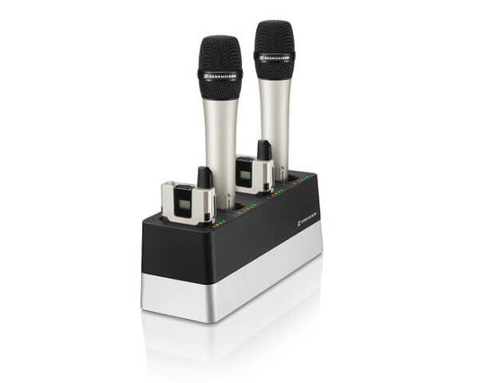 Sennheiser CHG 4N EU Charging Unit with 4 compartments for handheld and bodypack transmitters, displaying the charging unit with transmitters in a sleek, black design.